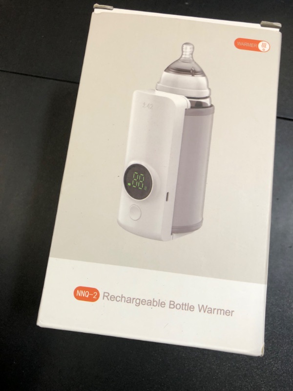 Photo 1 of Portable Bottle Warmer for Travel, Fast Warming Comfortable Baby Feeding On The Go, Waterless Milk Warming with Battery-Powered for Home Outdoor