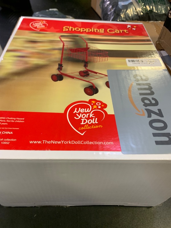 Photo 1 of The New York Doll Collection Toy Shopping Cart for Kids and Toddler - Includes Food - Folds for Easy Storage - with Sturdy Metal Frame (Red)
