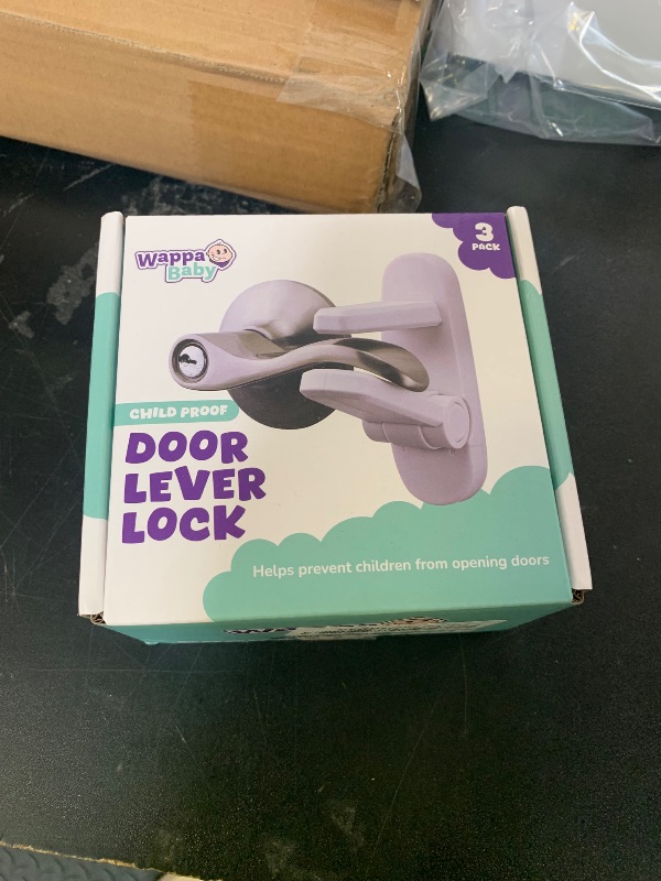 Photo 1 of Door Lever Lock (3 Pack) Prevents Toddlers from Opening Doors. 3.25" L * 1.5" W * 4.5" H Easy One Hand Operation for Adults. Durable ABS with 3M Adhesive Backing. Simple Install, No Tools Needed.