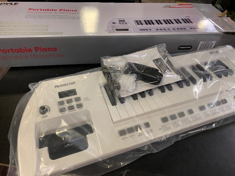 Photo 1 of PYLE Electric Piano, 37 Keys Electric Keyboard Piano, Music Keyboard - Built-in Stereo Speakers, Rechargeable Battery, Wired Microphone, Portable Design, 200 Tones, 200 Rhythms, 50 Demos Included