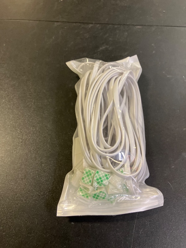 Photo 1 of Phone extension Cord 25 Ft, Telephone Cable with Standard RJ11 Plug and 1 in-Line Couplers and 20 Cable Clip Holders, White