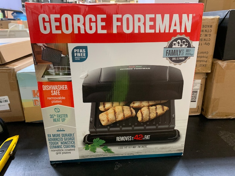 Photo 1 of **DAMAGE** George Foreman 4-Serving Removable Plate Electric Grill and Panini Press, George Tough Non-Stick Coating, Drip Tray Catches Grease, Black