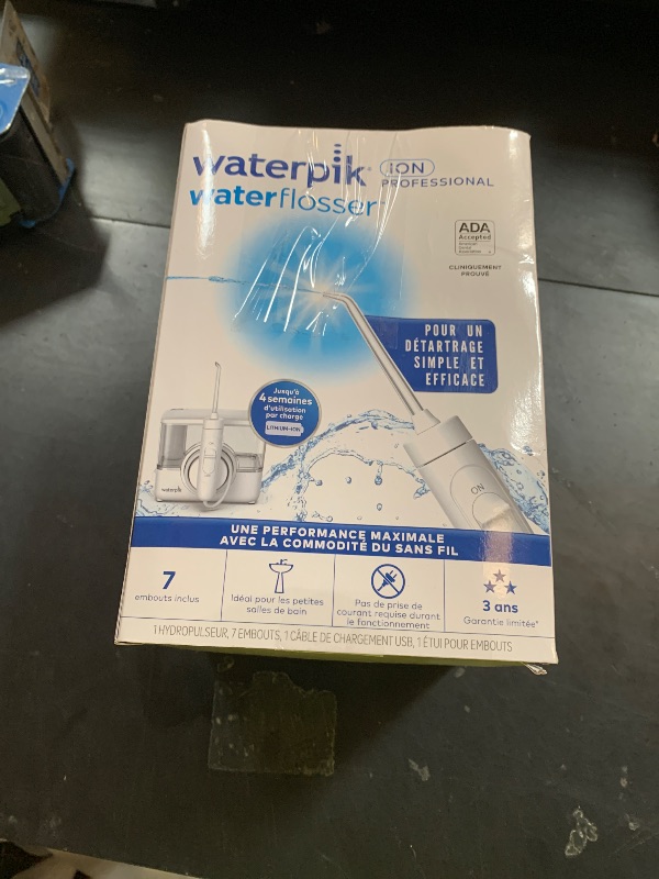 Photo 1 of Waterpik ION Professional Water Flosser, Rechargeable and Portable for Teeth, Gums, Braces, 10 Settings, 7 Flossing Tips For Multiple Users And Needs, ADA Accepted, WF-12 White, Packaging May Vary