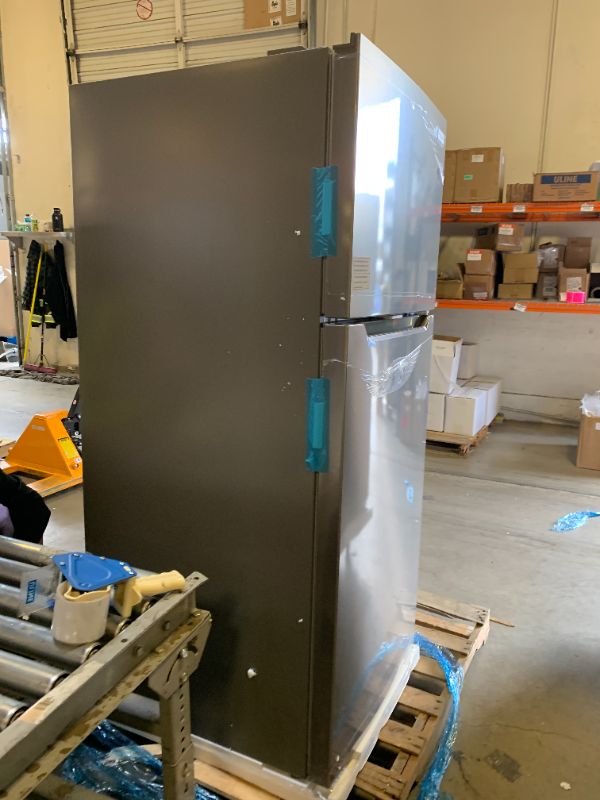 Photo 1 of Frigidaire FFHT1822UV 18 cu. ft. Refrigerator with Spacious Interior Storage, Humidity Controlled Crispers to keep produce fresh for longer, Bright LED Lighting, Energy Star Certified, in Silver