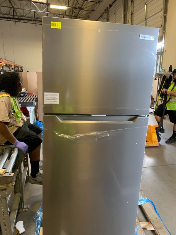 Photo 1 of Frigidaire FFHT1822UV 18 cu. ft. Refrigerator with Spacious Interior Storage, Humidity Controlled Crispers to keep produce fresh for longer, Bright LED Lighting, Energy Star Certified, in Silver