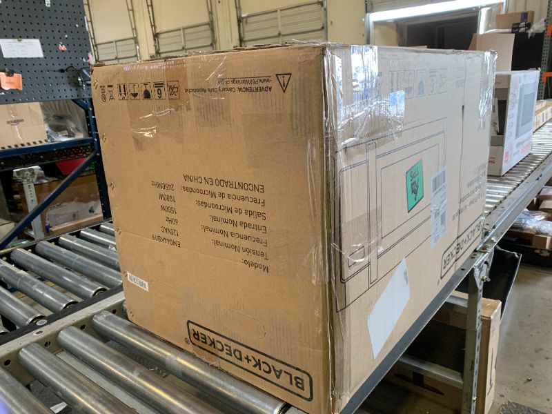 Photo 1 of BLACK+DECKER EM044KB19 Over The Range Microwave Oven with One Touch, 1000 Watts, 400 CFM and Auto Cooking, OTR 1.9 Cu.ft