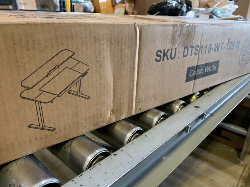 Photo 1 of white standing desk