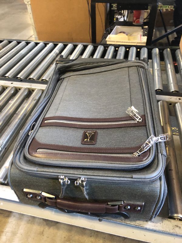 Photo 1 of Travelpro Platinum Elite Softside Expandable Carry on Luggage, 8 Wheel Spinner Suitcase, USB Port, Suiter, Men and Women, Vintage Grey, Carry On 21-Inch