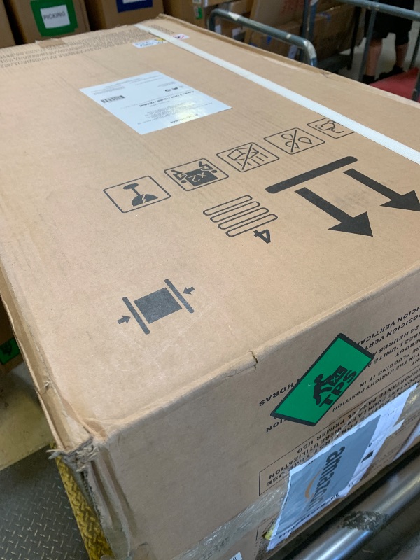 Photo 1 of Amazon Basics 4-In-1 Portable Air Conditioner with Remote, Timer, Sleep Mode, Auto Swing, Cool/Heat/Dry/Fan-Only Functions, 13500 BTU (ASHRAE), Cools Up to 550 Sqf, Energy Saving, White