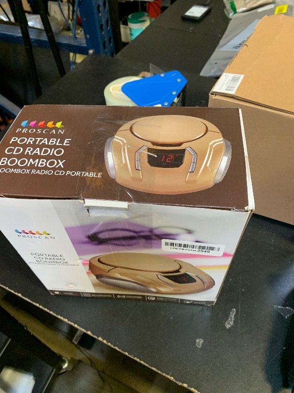 Photo 1 of **DAMAGED** SYLVANIA SRCD261-B-CHAMPAGNE Portable CD Player with AM/FM Radio (Champagne)