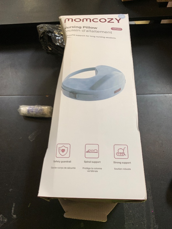 Photo 1 of Momcozy Innovative Safety Guard Nursing Pillow - Firm & Springy Memory Foam - Stable, Ergonomic Support & Comfort - Wider Breastfeeding Cushion, Adjustable, Removable Cover, Baby Safety Certified