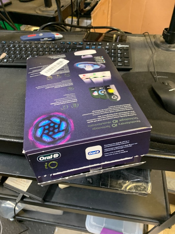 Photo 1 of Oral-B Rechargeable Electric Toothbrush, iO9 Genius, 7 Cleaning Modes, Interactive Display, Charging Travel Case, Visible Pressure Sensor, 4 Brush Heads, White Alabaster