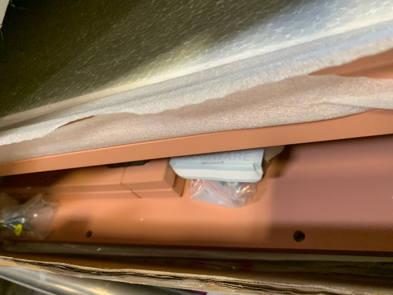 Photo 1 of Babyletto Origami Mini Portable Folding Crib with Wheels in Canyon, 2 Adjustable Mattress Positions, Greenguard Gold Certified