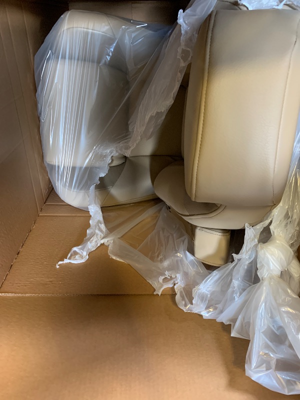 Photo 1 of tan leather passenger car seat