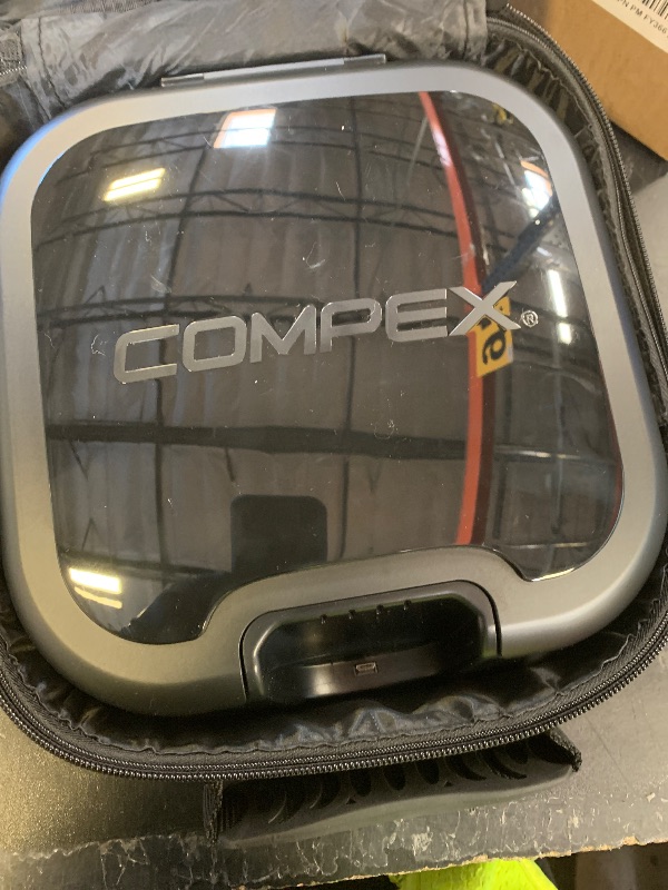 Photo 1 of Compex Wireless USA 2.0 Muscle Stimulator w/TENS Bundle Kit: Muscle Stimulation Machine, with Snap Electrodes,Programs, Wireless PODs etc, Black