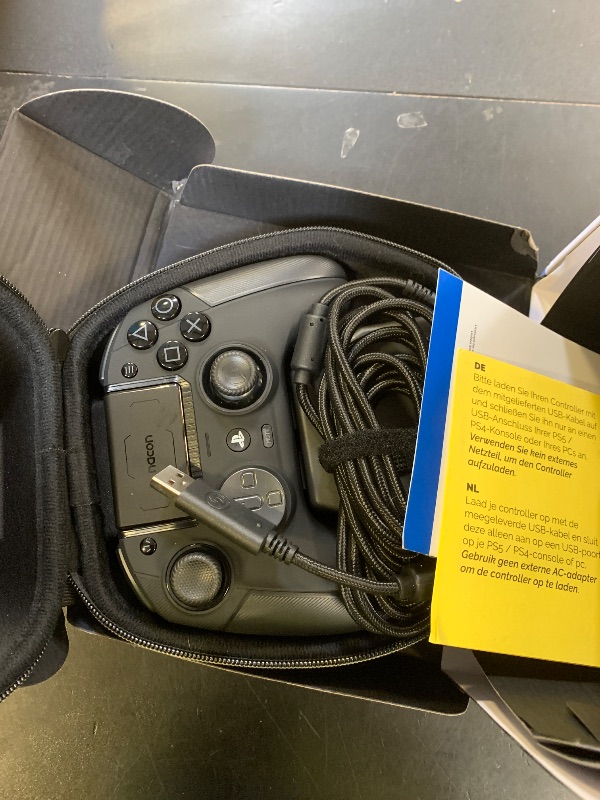 Photo 1 of NACON Revolution 5 Pro Officially Licensed PlayStation Wireless Gaming Controller for PS5 / PS4 / PC - Hall Effect, Trigger Stops, Mappable Buttons, Bluetooth Audio - Triple Black