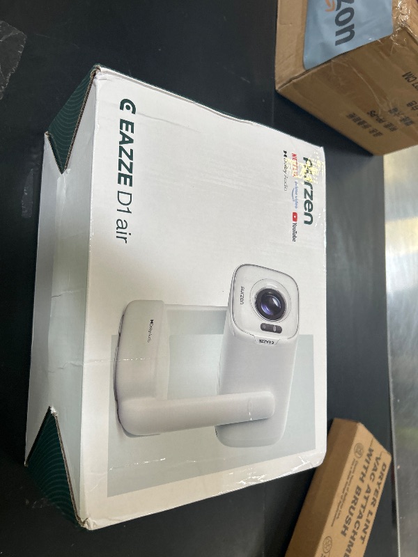 Photo 1 of Aurzen D1 air Smart Portable Projector with WiFi and Bluetooth, USB-C Powered, Easy Auto Setup, 16W Dolby Audio, Built-in Apps, Native 1080P HDR10, Outdoor Movie Projector, White