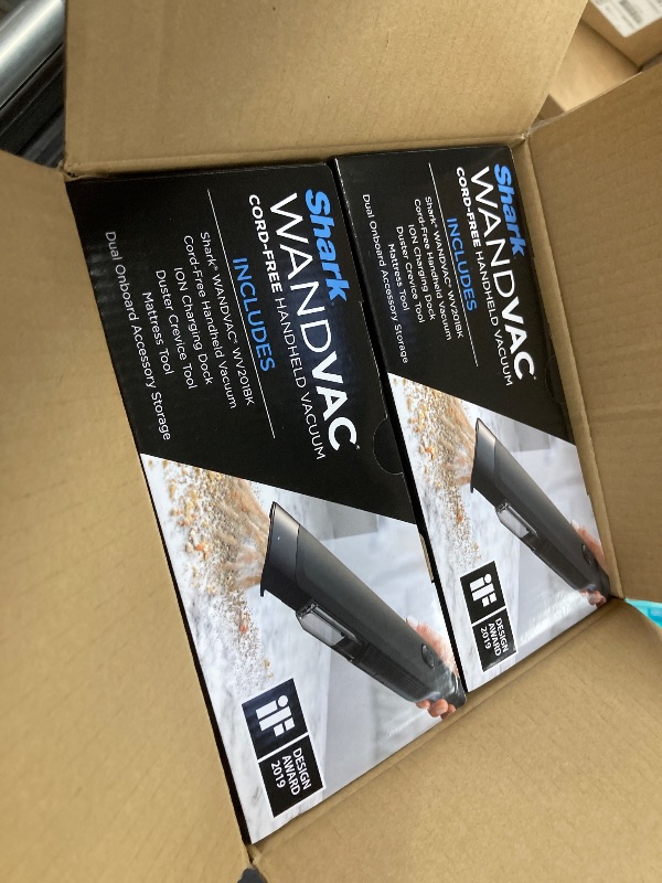 Photo 1 of ++closed by factory+++Shark WANDVAC Cordless Hand Vac, Lightweight, Versatile and Portable at 1.4 lbs., Powerful Suction for Pet Hair, Charging Dock, One-Touch Empty for Car & Home, Duster Crevice Tool, Black, WV201BK