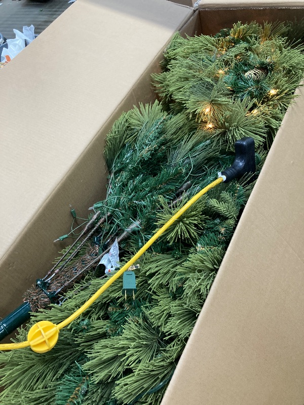 Photo 1 of *HEAVY* National Tree Company 7.5 ft Pre-Lit Carolina Pine Artificial Christmas Tree, 750 Clear Lights, 1,399 Tips, Includes Stand, Green