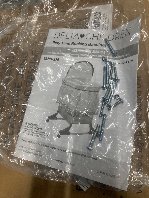 Photo 1 of *May be missing Hardware?* Delta Children Portable Rocking Bassinet for Newborns Bedside Sleeper Crib with Gentle Vibrations, Nightlight, Soothing Music, Adjustable Canopy, Plush Toys, Storage Basket, Baby Essentials