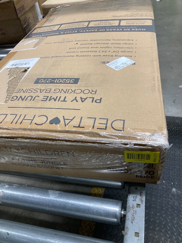 Photo 1 of *May be missing Hardware?* Delta Children Portable Rocking Bassinet for Newborns Bedside Sleeper Crib with Gentle Vibrations, Nightlight, Soothing Music, Adjustable Canopy, Plush Toys, Storage Basket, Baby Essentials