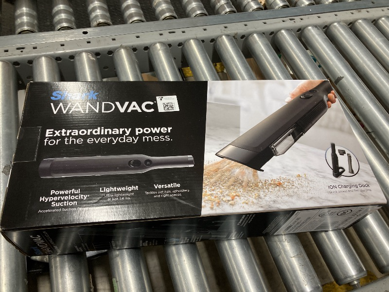 Photo 1 of Shark WANDVAC Cordless Hand Vac, Lightweight, Versatile and Portable at 1.4 lbs., Powerful Suction for Pet Hair, Charging Dock, One-Touch Empty for Car & Home, Duster Crevice Tool, Black, WV201BK