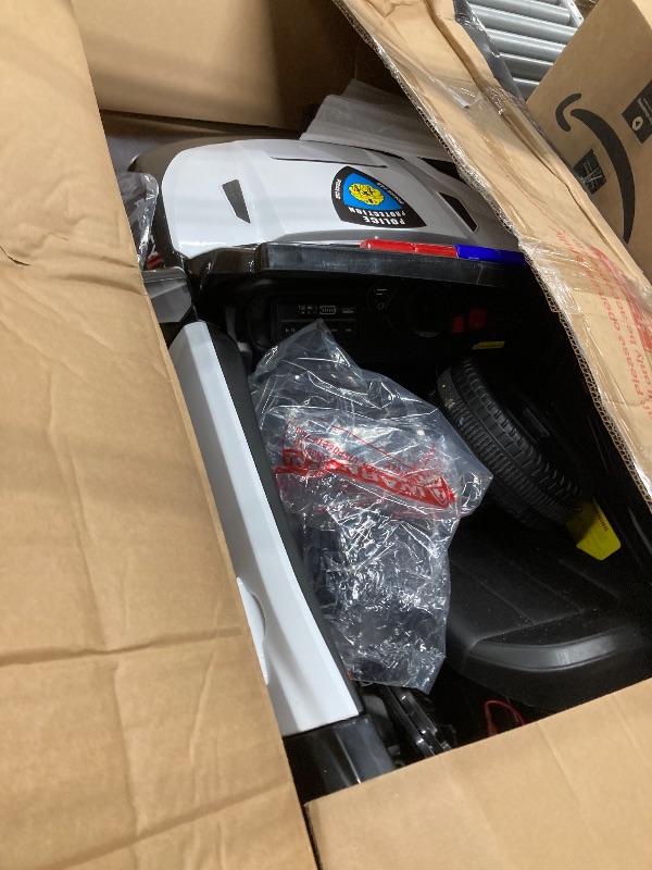 Photo 1 of 12V Police Car Ride On Toy for Kids with Remote Control,Megaphone, LED Lights, Alarm Sounds, Music, Battery Powered Electric Cop Car Gift for Boys Girls Ages 37+ Months