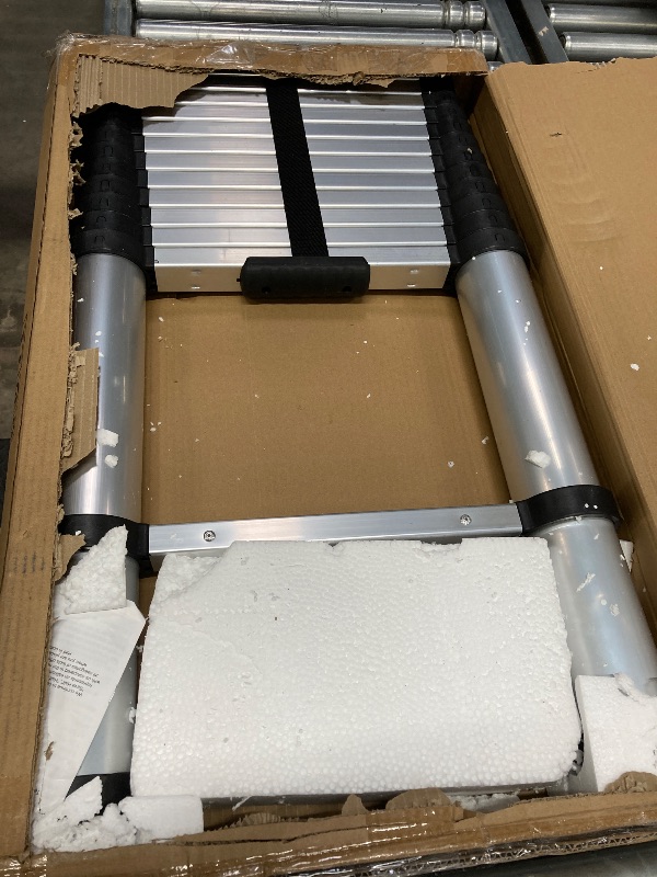 Photo 1 of VEVOR Telescoping Ladder, 12.5 FT Aluminum One-button Retraction Collapsible Extension Ladder, 375 LBS Capacity with Non-slip Feet, Portable Multi-purpose Compact Ladder for Home, RV, Loft, ANSI Liste