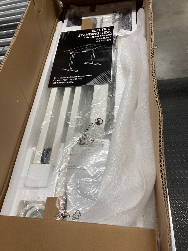 Photo 1 of **The photo and description are for reference only.***ErGear Height Adjustable Electric Standing Desk, 47.2 x 23.6 Inches Sit Stand up Desk, Memory Computer Home Office Desk with Two-Piece Desktop (Black)