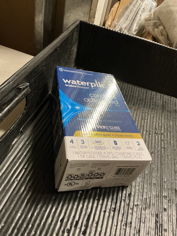 Photo 1 of Waterpik Cordless Advanced 2.0 Water Flosser For Teeth, Gums, Braces, Dental Care With Travel Bag and 4 Tips, ADA Accepted, Rechargeable, Portable, and Waterproof, Gray WP-587, Packaging May Vary