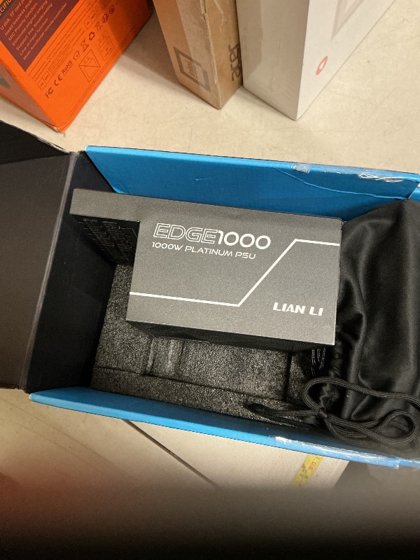 Photo 1 of Lian Li Edge Series-1000W Full Modular Power Supply-80 Plus Platinum-ATX 3.0, 3.1-PCIE 5.1-L-Shape Design for Dual Chamber Case-120mm FDB Fan-Supports up to 4X USB Devices-Black (EG1000BE.US)