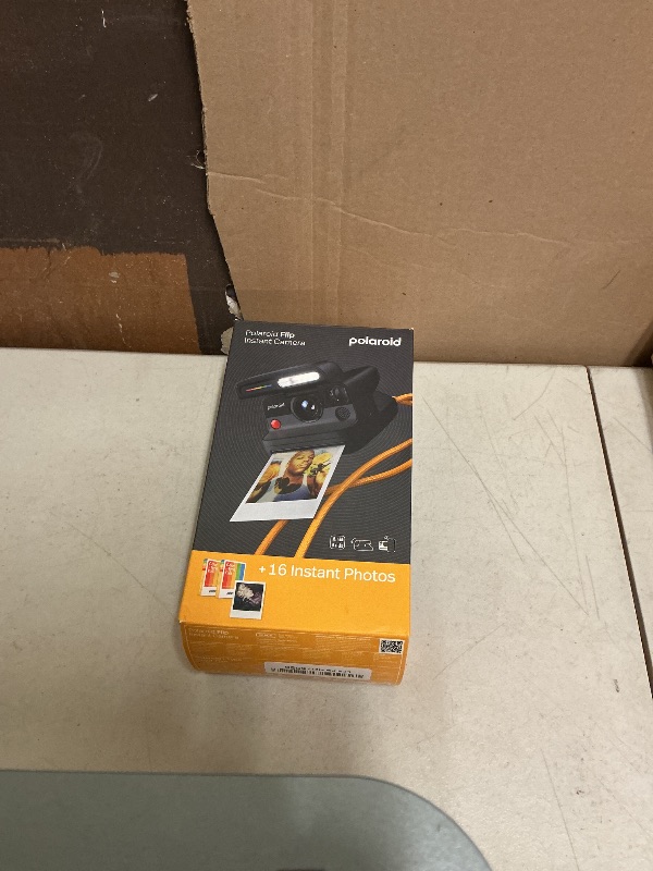 Photo 1 of Polaroid Flip Instant Camera + Color Film Bundle (16 Photos Included) - Black (6565) - Hyperfocal 4-Lens System, Sonar autofocus, and Sence Analysis with Bluetooth paired Companion app