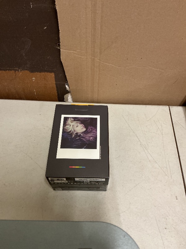 Photo 1 of Polaroid Flip Instant Camera + Color Film Bundle (16 Photos Included) - Black (6565) - Hyperfocal 4-Lens System, Sonar autofocus, and Sence Analysis with Bluetooth paired Companion app