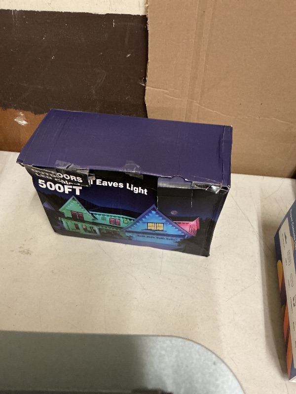 Photo 1 of RCUICA 500FT Permanent Outdoor Lights Waterproof with Smart App Control Remote,DIY Scene Modes,Music Sync hronization,Eaves Lights for Garden Decor,Deck,Christmas (500FT)