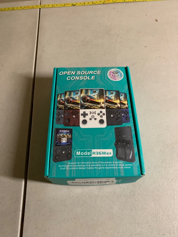 Photo 1 of R36MAX Retro Handheld Game Console - 64GB Preloaded Classic Video Games, Support 30+ Simulators, Linux-Powered Portable Game Emulator Console with 4.0-in HD IPS Screen (Transparent Blue)
