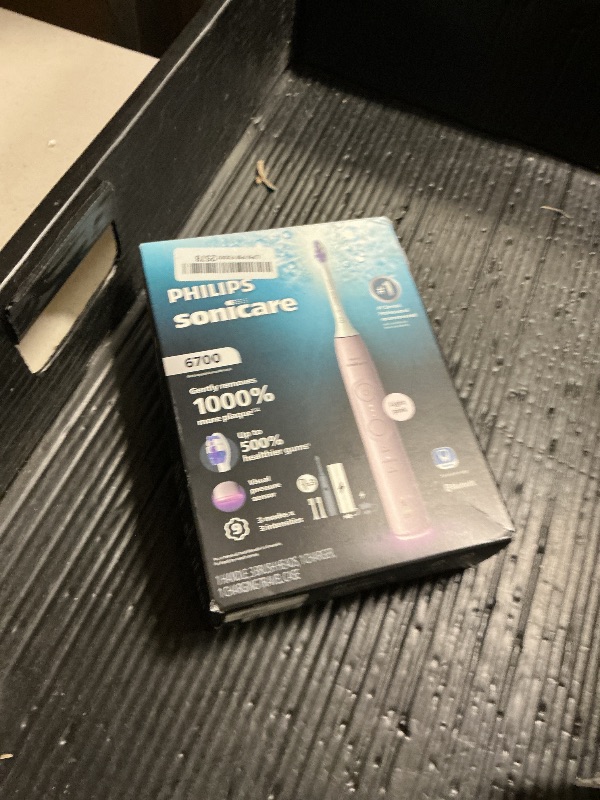 Photo 1 of Philips Sonicare 6700 Series Electric Toothbrush - Next-Generation Sonicare Technology, Pressure Sensor, 9 Brushing Settings, SmarTimer, 21-Day Runtime, Travel Case, Light Pink, HX7412/04
