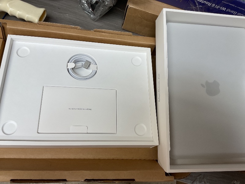 Photo 1 of SEE NOTES AND PICTURES,,,,,,Apple 2025 MacBook Air 13-inch Laptop with M4 chip: Built for Apple Intelligence, 13.6" Liquid Retina Display, 16GB Unified Memory, 512GB SSD Storage, 12MP Center Stage Camera, Touch ID, Silver