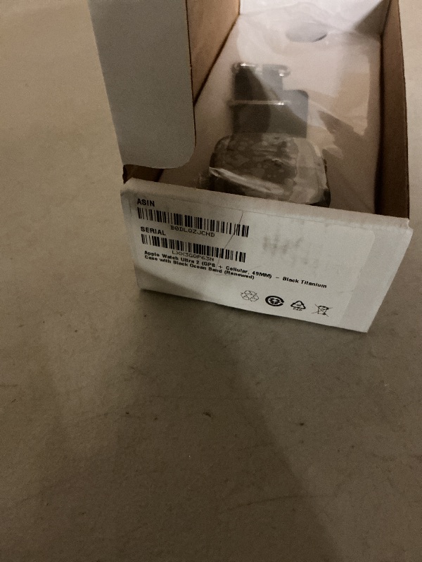 Photo 1 of Apple Watch Ultra 2 (GPS + Cellular, 49MM) - Black Titanium Case with Black Ocean Band (Renewed)