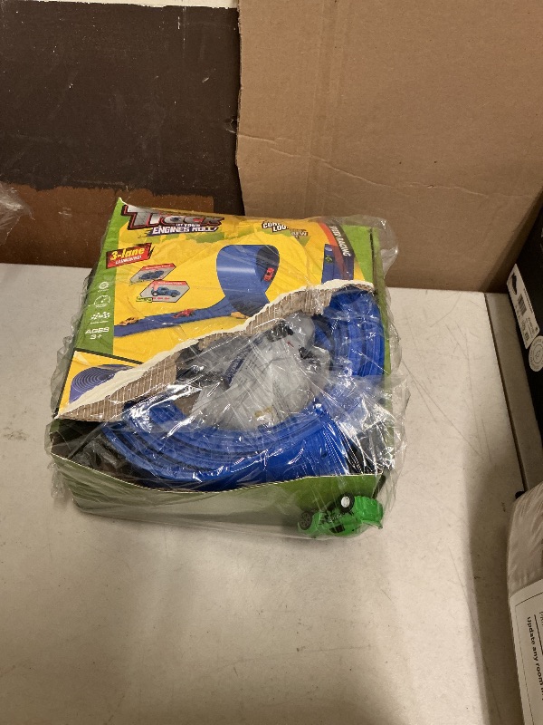 Photo 1 of 16.5ft Build Anywhere Portable Race Track with Suction Cups - Flexible Roll-Up Design Fits 1/64 Scale Cars, Portable Toy Gift for Kids 4+ Year Old (3 Tracks/Blue)