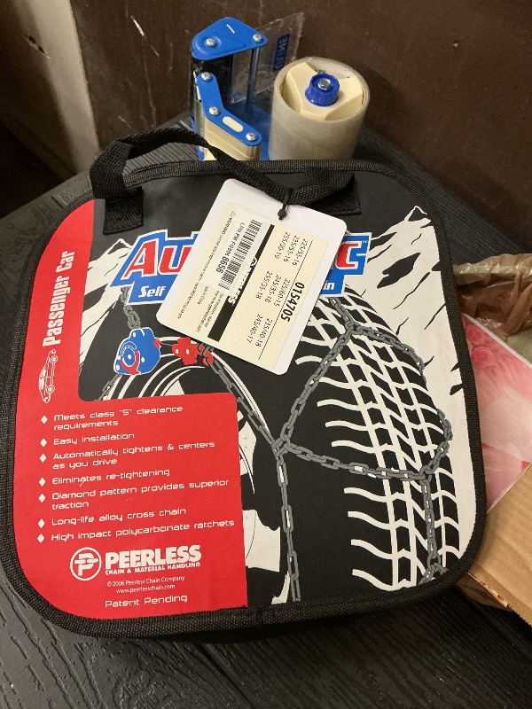 Photo 1 of SCC 0154705 Auto-Trac Tire Traction Chain - Set of 2