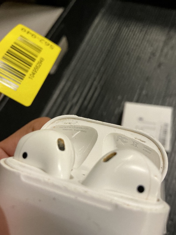 Photo 1 of Apple AirPods Wireless Ear Buds, Bluetooth Headphones with Lightning Charging Case Included, Over 24 Hours of Battery Life, Effortless Setup for iPhone