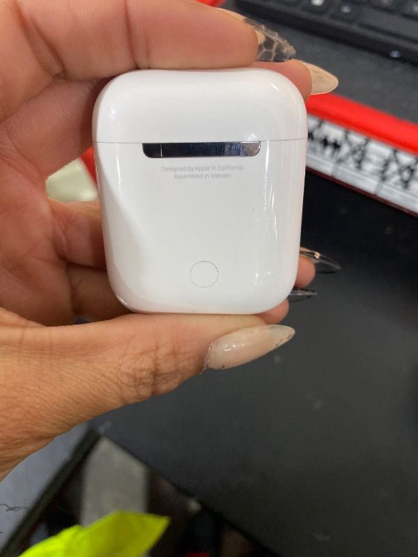 Photo 4 of Apple AirPods Wireless Ear Buds, Bluetooth Headphones with Lightning Charging Case Included, Over 24 Hours of Battery Life, Effortless Setup for iPhone