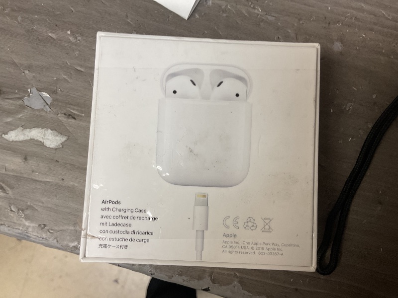 Photo 1 of Apple AirPods Wireless Ear Buds, Bluetooth Headphones with Lightning Charging Case Included, Over 24 Hours of Battery Life, Effortless Setup for iPhone