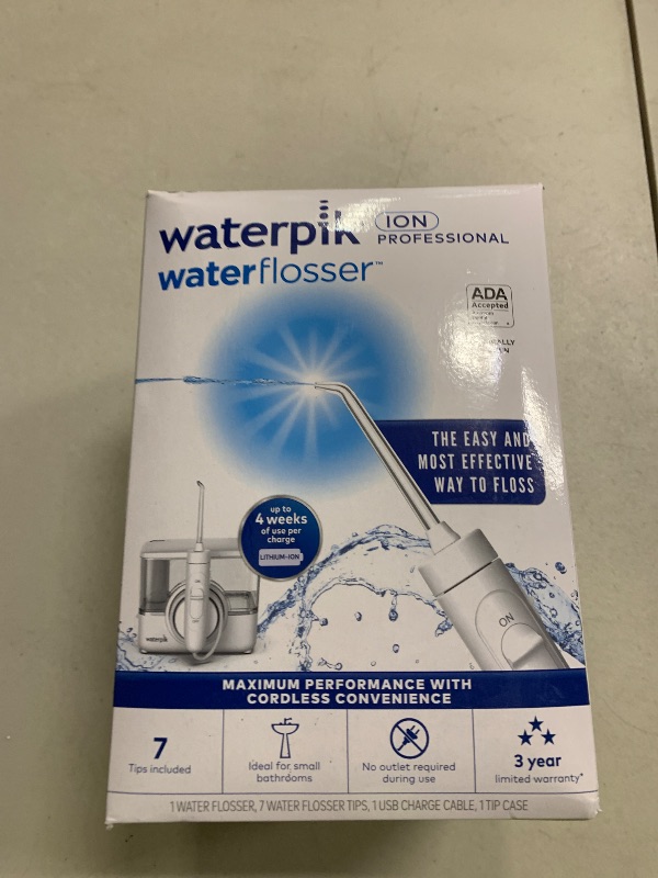 Photo 1 of Waterpik ION Professional Water Flosser, Rechargeable and Portable for Teeth, Gums, Braces, 10 Settings, 7 Flossing Tips For Multiple Users And Needs, ADA Accepted, WF-12 White, Packaging May Vary