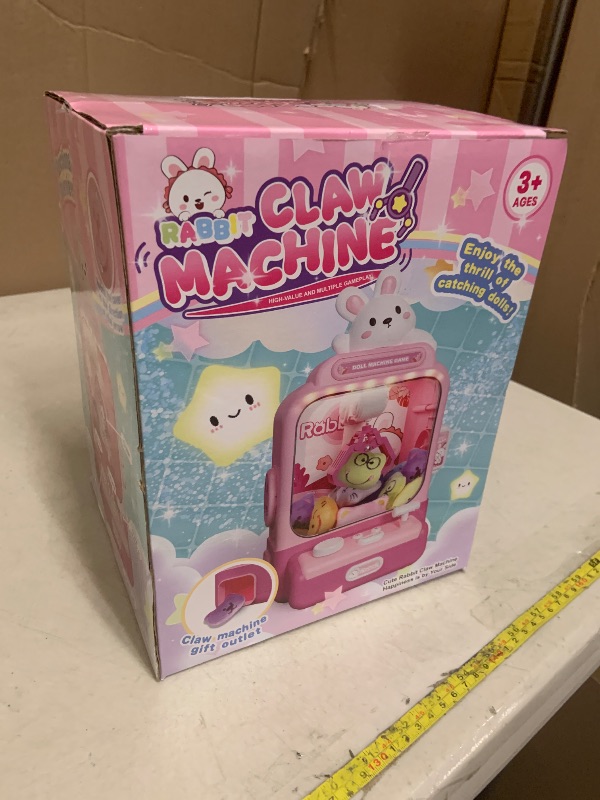 Photo 1 of Claw Machine for Kids, Bunny Toy Glowing Arcade Game with LED Lights & Sound, Mini Rabbit Vending Machines Candy Grabber Prize Dispenser with Mini Plush Dolls, Home Party Easter Birthday Gifts