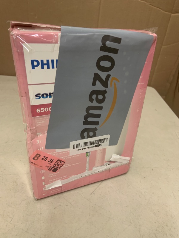 Photo 1 of Philips Sonicare ProtectiveClean 6500 Rechargeable Electric Toothbrush, with Pressure Sensor, 3 Cleaning Modes, SmarTimer and QuadPacer, 14-Day Battery Life, Charging Travel Case, Pink, HX6462/06