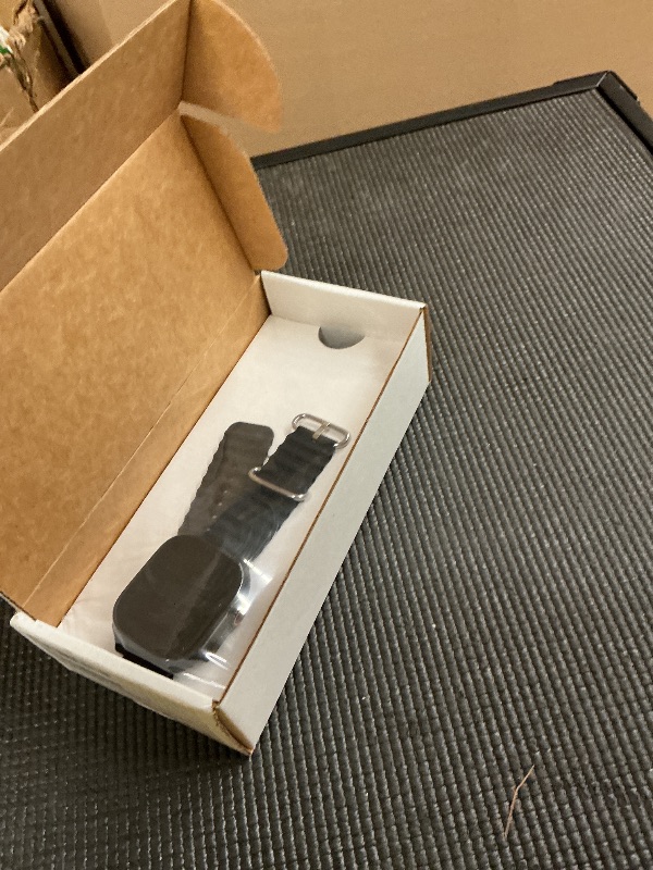 Photo 1 of Apple Watch Ultra 2 (GPS + Cellular, 49MM) - Black Titanium Case with Black Ocean Band (Renewed)