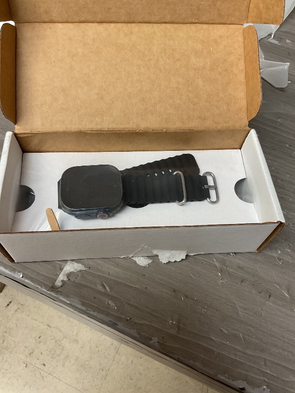Photo 1 of Apple Watch Ultra 2 (GPS + Cellular, 49MM) - Black Titanium Case with Black Ocean Band (Renewed)
