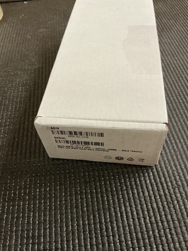 Photo 1 of Apple Watch Ultra 2 (GPS + Cellular, 49MM) - Black Titanium Case with Black Ocean Band (Renewed)