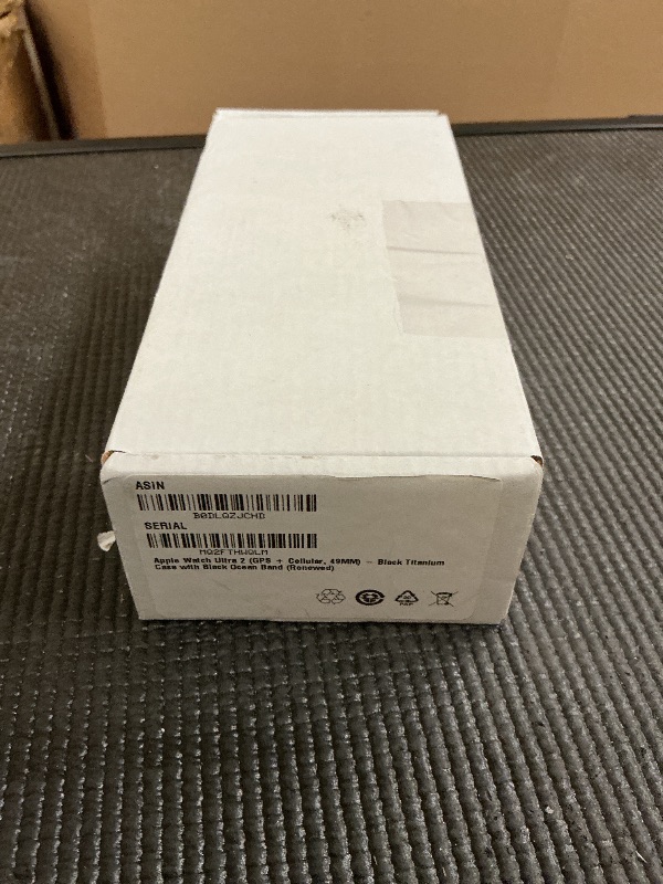 Photo 1 of Apple Watch Ultra 2 (GPS + Cellular, 49MM) - Black Titanium Case with Black Ocean Band (Renewed)